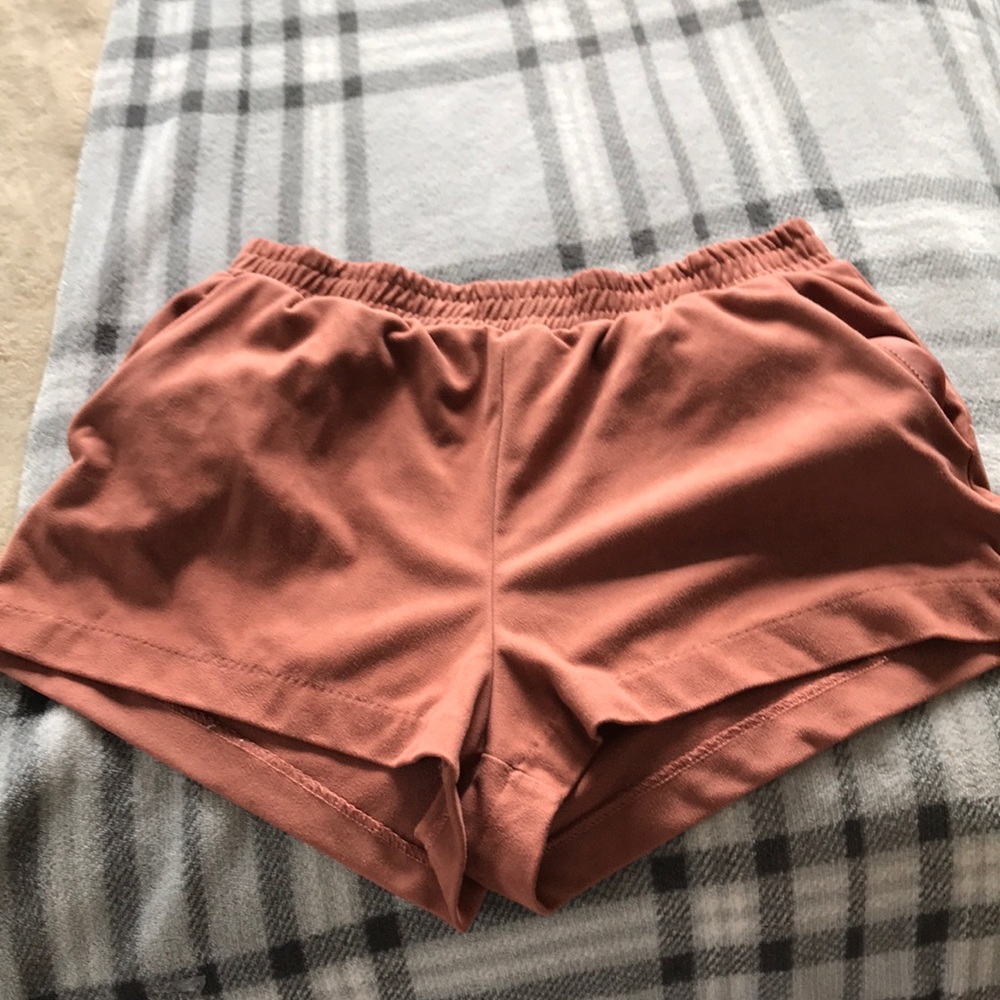pink velvet type shorts.